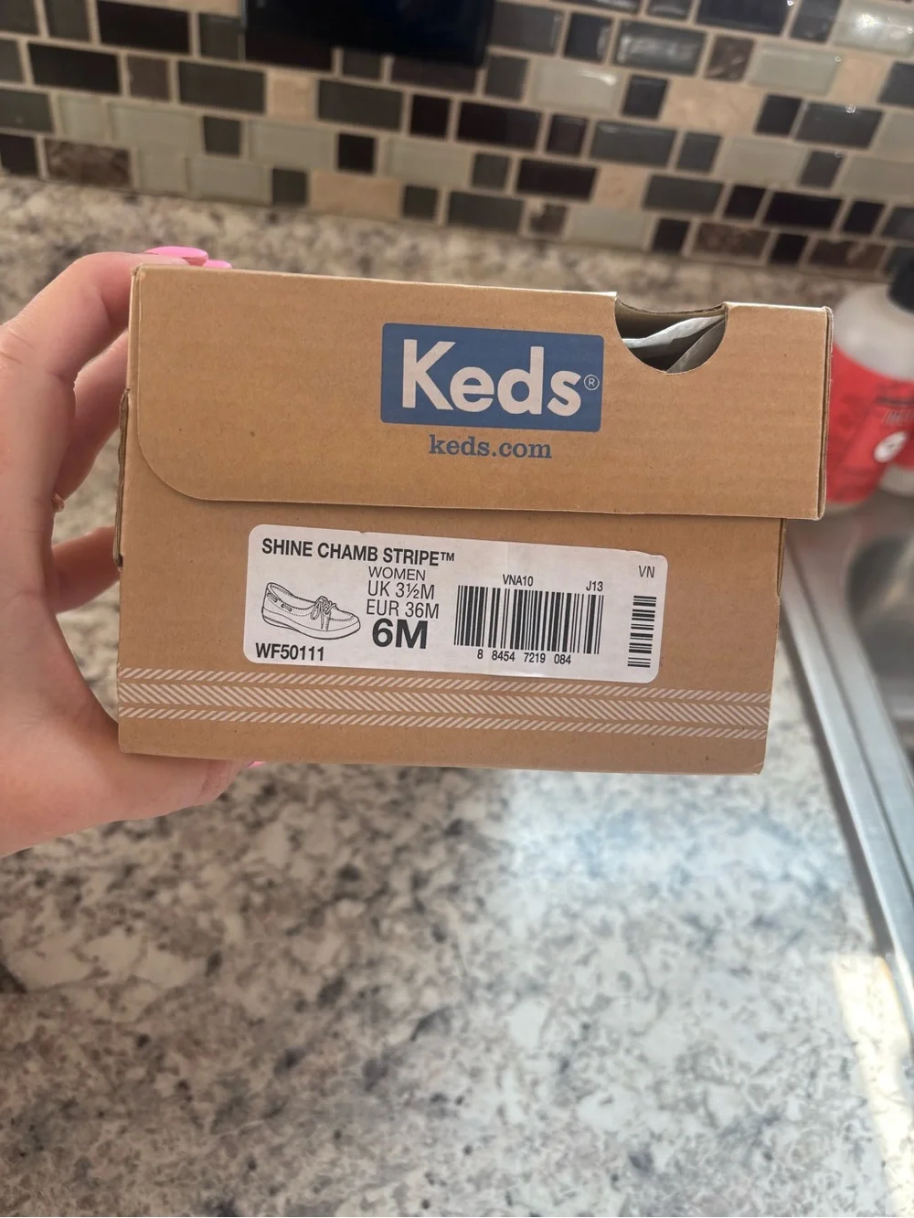 Keds lace up boat style shoe